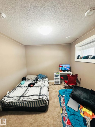 311 401 Southfork Drive, Leduc, AB - Indoor Photo Showing Bedroom