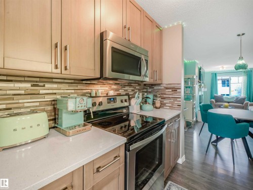 Image quality insufficient for description - 44 1140 Chappelle Boulevard, Edmonton, AB - Indoor Photo Showing Kitchen With Stainless Steel Kitchen With Upgraded Kitchen