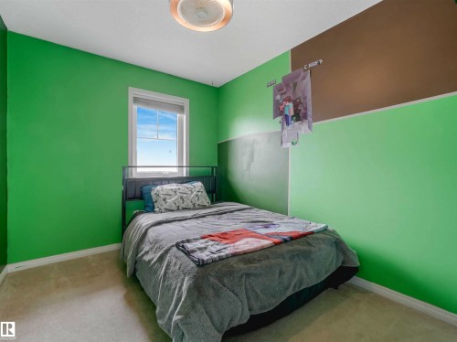 Image quality insufficient for description - 44 1140 Chappelle Boulevard, Edmonton, AB - Indoor Photo Showing Bedroom