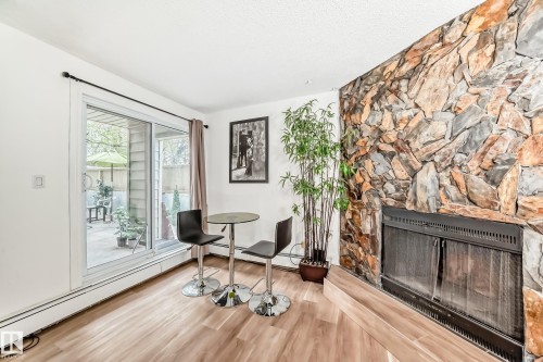 G3 10138 116 Street, Edmonton, AB - Indoor With Fireplace