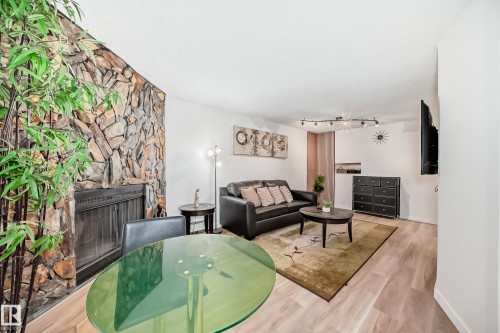 G3 10138 116 Street, Edmonton, AB - Indoor With Fireplace