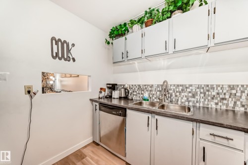G3 10138 116 Street, Edmonton, AB - Indoor Photo Showing Kitchen With Double Sink