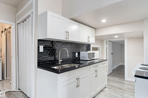 3214 71 Street, Edmonton, AB - Indoor Photo Showing Kitchen With Double Sink