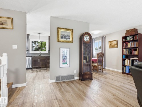 Open concept living area with wood-finish flooring - 18627 62A Avenue, Edmonton, AB - Indoor