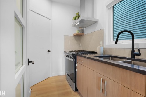 3319 Chickadee Drive, Edmonton, AB - Indoor Photo Showing Kitchen With Double Sink