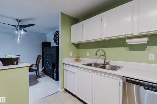 15017 26 Street, Edmonton, AB - Indoor Photo Showing Kitchen With Double Sink