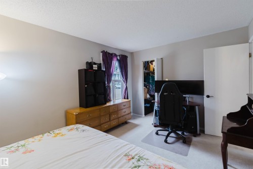 15017 26 Street, Edmonton, AB - Indoor Photo Showing Bedroom