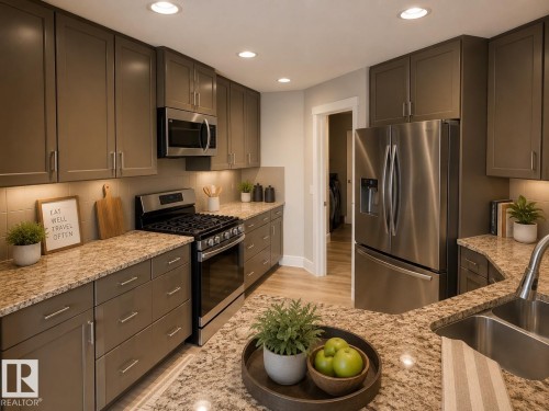 Contemporary kitchen featuring extensive cabinetry, stainless steel appliances, speckled stone countertops, a tile backsplash, and recessed lighting - 648 178 Street, Edmonton, AB - Indoor Photo Showing Kitchen With Double Sink With Upgraded Kitchen