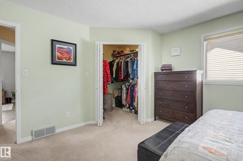 24 Elbow Drive, Devon, AB - Indoor Photo Showing Bedroom