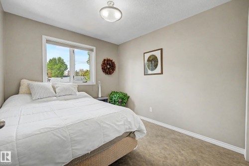 24 Elbow Drive, Devon, AB - Indoor Photo Showing Bedroom
