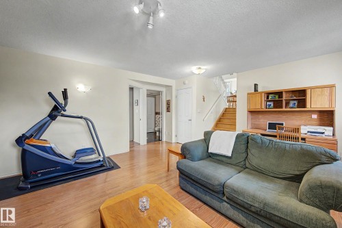 24 Elbow Drive, Devon, AB - Indoor Photo Showing Living Room
