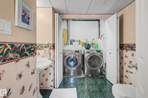 24 Elbow Drive, Devon, AB - Indoor Photo Showing Laundry Room