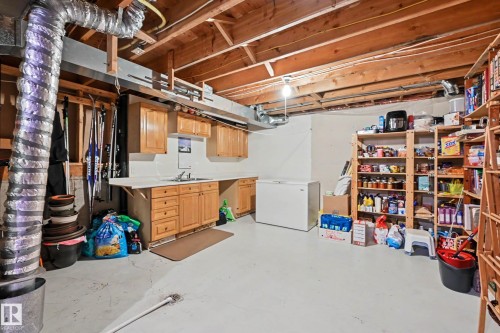 24 Elbow Drive, Devon, AB - Indoor Photo Showing Basement