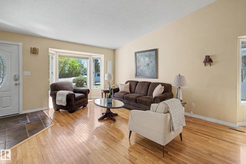 24 Elbow Drive, Devon, AB - Indoor Photo Showing Living Room