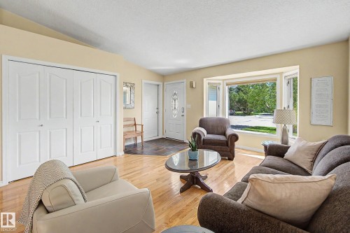 24 Elbow Drive, Devon, AB - Indoor Photo Showing Living Room