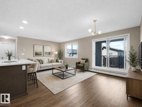210 394 Windermere Road, Edmonton, AB - Indoor Photo Showing Living Room