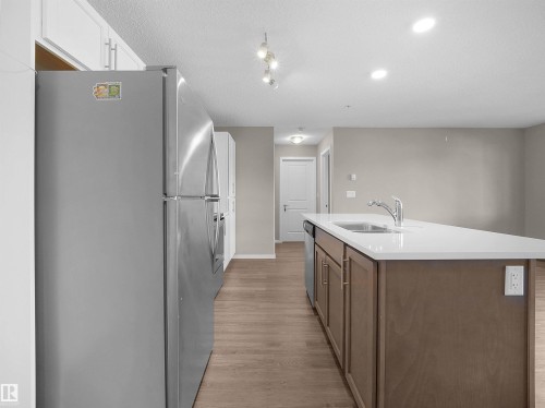 210 394 Windermere Road, Edmonton, AB - Indoor Photo Showing Kitchen With Double Sink