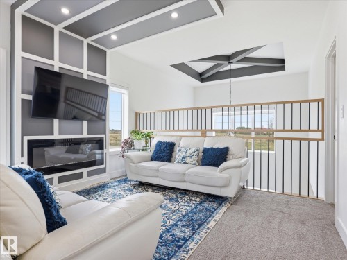 622 Astoria Way, Devon, AB - Indoor Photo Showing Living Room With Fireplace