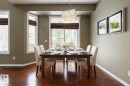 Dining room with dark wood-type flooring and hanging lights - 11622 11 Avenue, Edmonton, AB  - Indoor Photo Showing Dining Room 