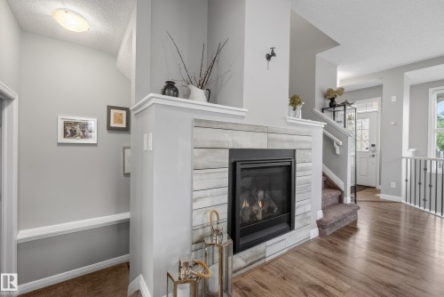 8416 23 Avenue, Edmonton, AB - Indoor Photo Showing Other Room With Fireplace