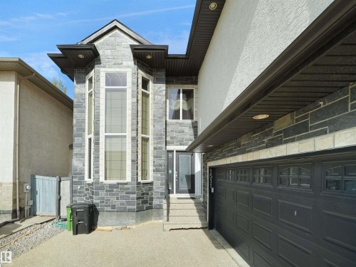 Contemporary facade featuring a prominent two-story bay window - 1511 69 Street, Edmonton, AB - Outdoor
