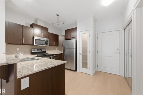 235 10121 80 Avenue, Edmonton, AB - Indoor Photo Showing Kitchen With Double Sink