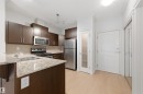 235 10121 80 Avenue, Edmonton, AB  - Indoor Photo Showing Kitchen With Double Sink 