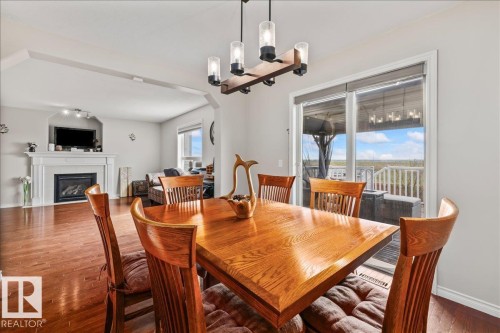76 Napoleon Crescent, St. Albert, AB - Indoor Photo Showing Dining Room With Fireplace