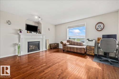 76 Napoleon Crescent, St. Albert, AB - Indoor Photo Showing Living Room With Fireplace