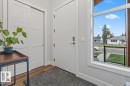 Entryway featuring wood-finish flooring, a full-lite door, and an expansive window - 10611 146 Street Nw, Edmonton, AB  - Indoor Photo Showing Other Room 