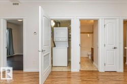 Wood-finish flooring extending through the hallway - 