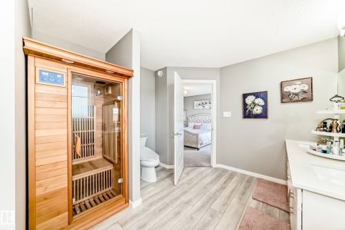 Built-in wood-paneled sauna featuring a glass door - 38 Prospect Place, Spruce Grove, AB - Indoor Photo Showing Other Room