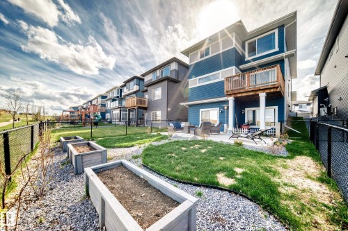 Modern multi-story residence with blue siding and white trim - 38 Prospect Place, Spruce Grove, AB - Outdoor