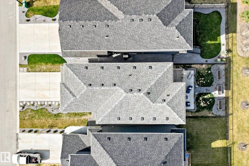 Property showcasing a multi-gabled roofline with numerous square vents - 38 Prospect Place, Spruce Grove, AB - Outdoor