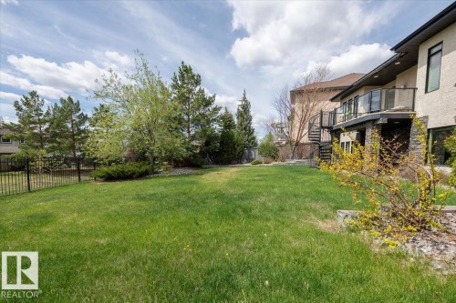 Expansive lawn featuring mature trees and shrubbery - 2413 Tegler Green, Edmonton, AB - Outdoor
