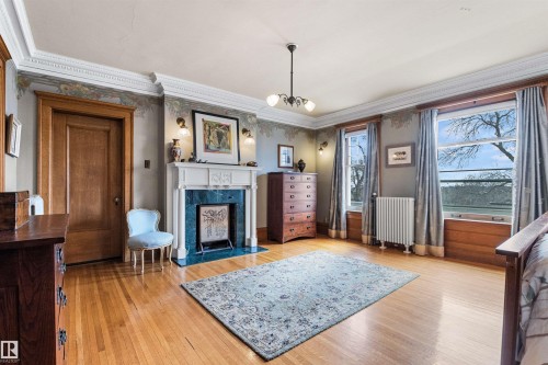 6210 Ada Boulevard Nw, Edmonton, AB - Indoor Photo Showing Other Room With Fireplace