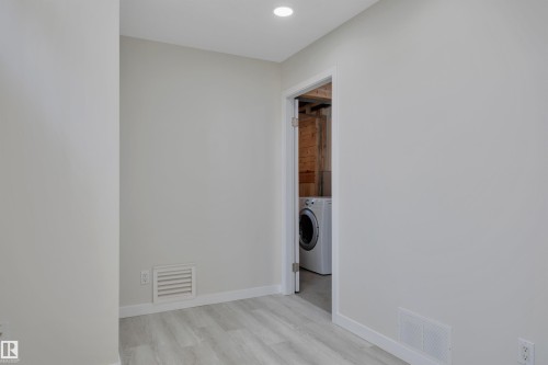 52 Pipestone Drive, Devon, AB - Indoor Photo Showing Laundry Room