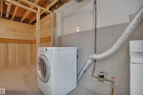 52 Pipestone Drive, Devon, AB - Indoor Photo Showing Laundry Room