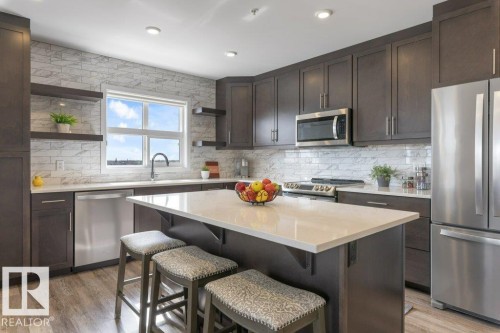 430 5504 Schonsee Drive, Edmonton, AB - Indoor Photo Showing Kitchen With Stainless Steel Kitchen With Upgraded Kitchen