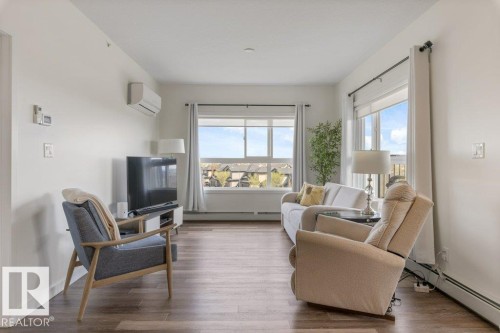 430 5504 Schonsee Drive, Edmonton, AB - Indoor Photo Showing Living Room