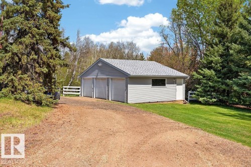 Triple garage/shop with work area with 220V, heated,  newer siding and shingles - 49 52257 Rge Road 231, Rural Strathcona County, AB 