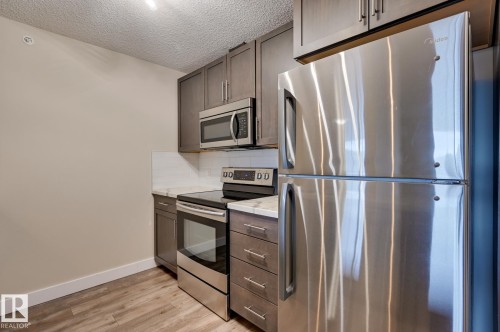 408 6084 Stanton Drive, Edmonton, AB - Indoor Photo Showing Kitchen With Stainless Steel Kitchen