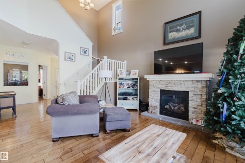 173 Sheppard Circle, Leduc, AB - Indoor Photo Showing Living Room With Fireplace