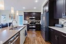 173 Sheppard Circle, Leduc, AB  - Indoor Photo Showing Kitchen With Double Sink With Upgraded Kitchen 