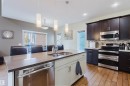 173 Sheppard Circle, Leduc, AB  - Indoor Photo Showing Kitchen With Double Sink With Upgraded Kitchen 
