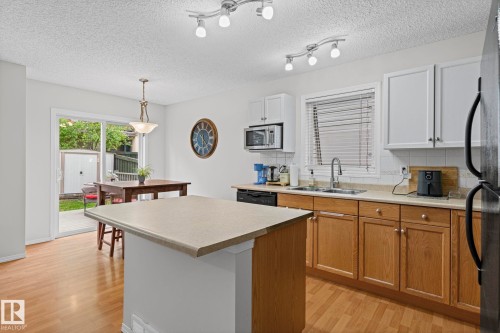 97 2021 Grantham Court Nw, Edmonton, AB - Indoor Photo Showing Kitchen With Double Sink