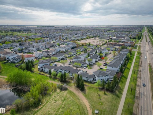 Residential community featuring single-family homes and multi-unit dwellings - 11 3380 28A Avenue Nw, Edmonton, AB - Outdoor With View