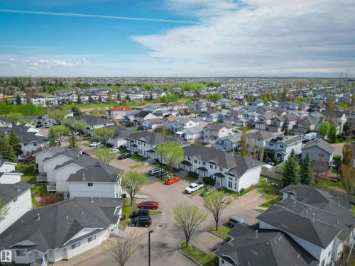 Expansive residential district featuring a network of neighborhood streets, numerous single-family homes, and multi-unit dwellings - 11 3380 28A Avenue Nw, Edmonton, AB - Outdoor With View