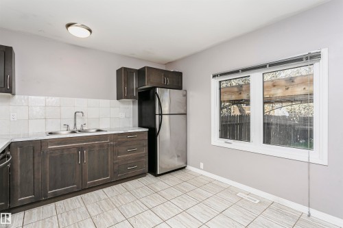 18425 95A Avenue, Edmonton, AB - Indoor Photo Showing Kitchen With Double Sink