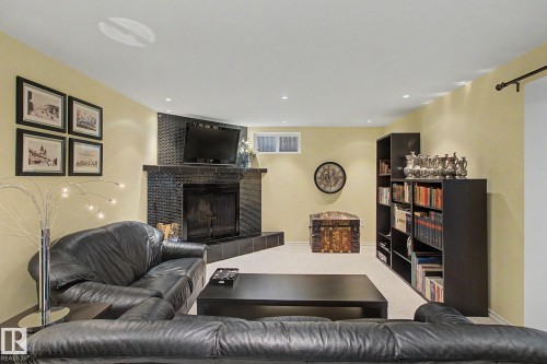 3748 117 Street, Edmonton, AB - Indoor Photo Showing Living Room With Fireplace